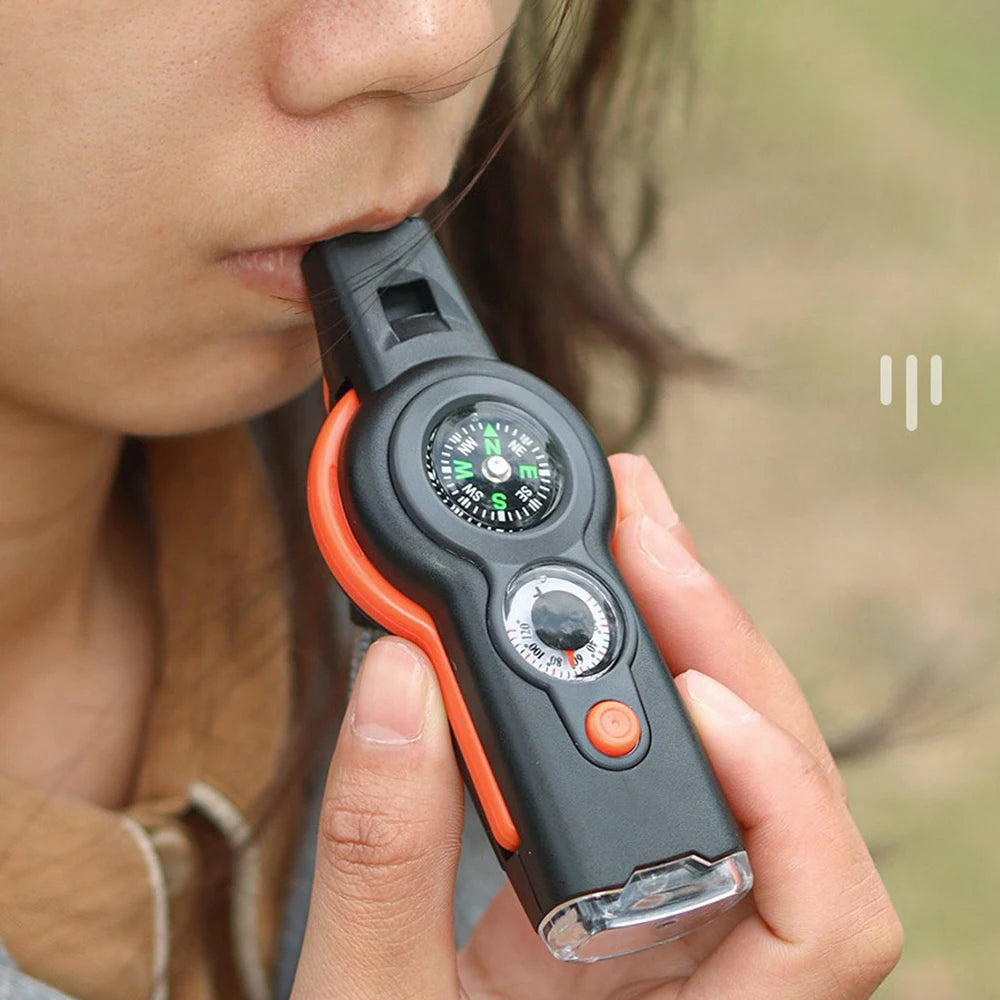 Seven in One Outdoor Survival Tool Whistle Compass Knife Bottle Opener Wrench